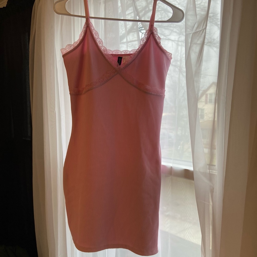 pink body con lace dress